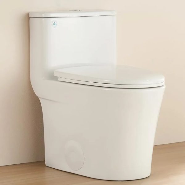 Small bathroom showcasing a space-saving toilet with a wider chair seat, maximizing space utilization.