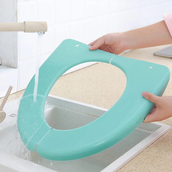 Child toilet seat with armrests in a variety of fun and colorful designs