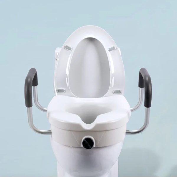 Person easily installing a removable raised toilet seat on a standard toilet.