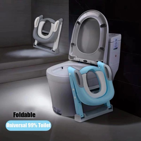 djustable potty training seat with ladder securely attached to a standard toilet bowl.