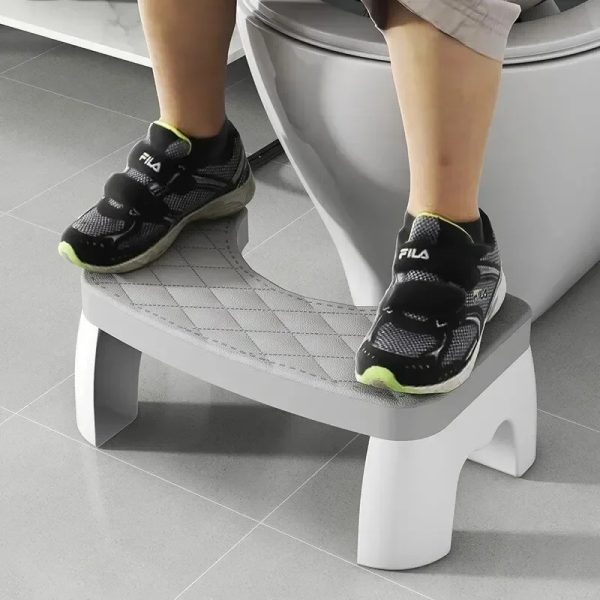 White toilet squat stool with a non-slip surface, promoting a natural squatting position for better bathroom comfort.