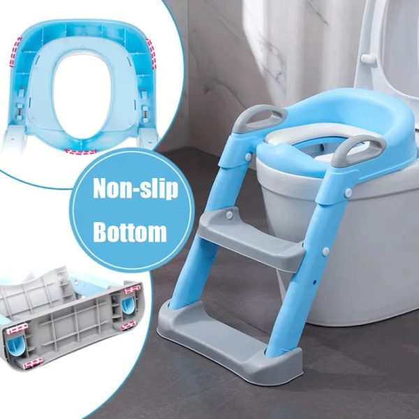 Happy toddler using a comfortable adjustable toilet seat with a sturdy ladder for easy access.