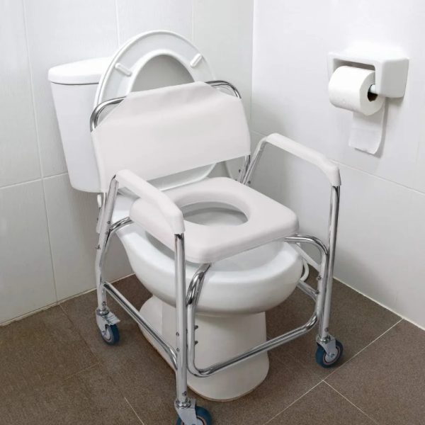 Rolling shower commode transport chair positioned securely over a standard toilet for easy toileting.